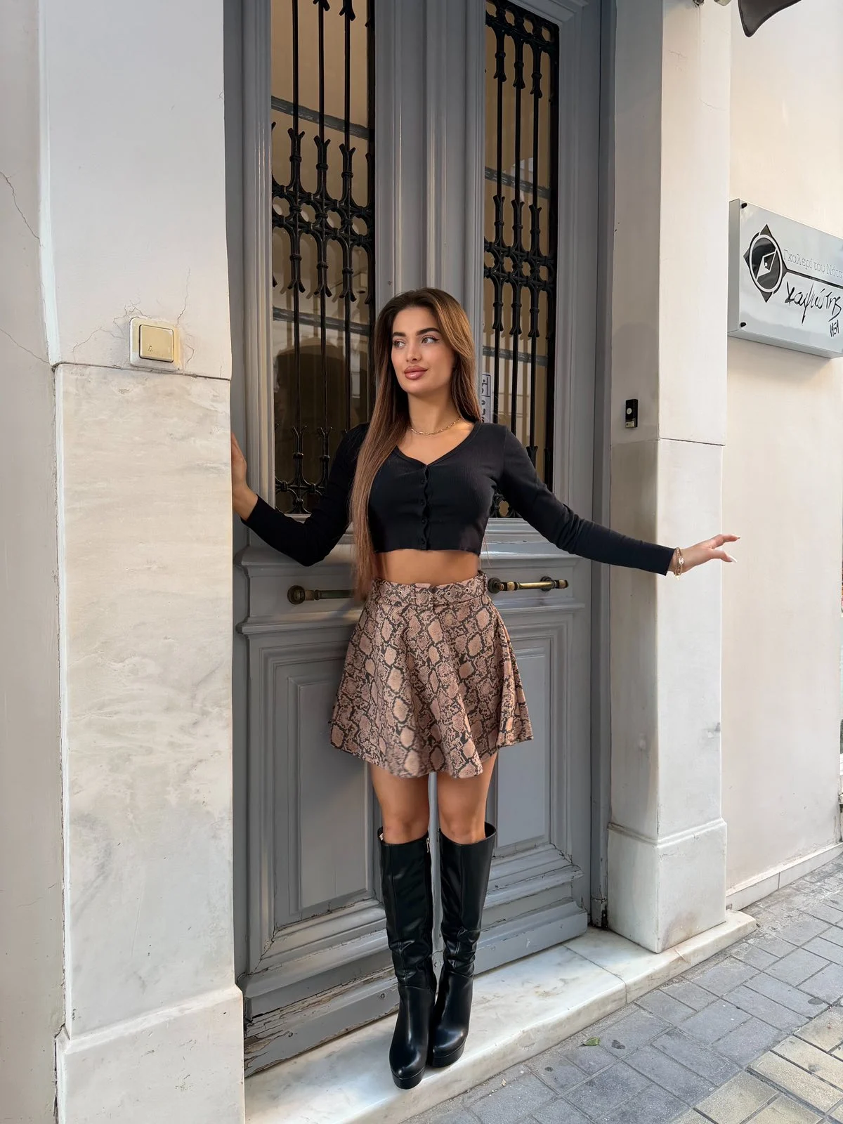 0-02-05-43662011996f894a7ab5ece86de1609a5fb71e3504f40ba00909d6c2f1294f4c_2230de3421e Snake Flare Mini Skirt - Image 1